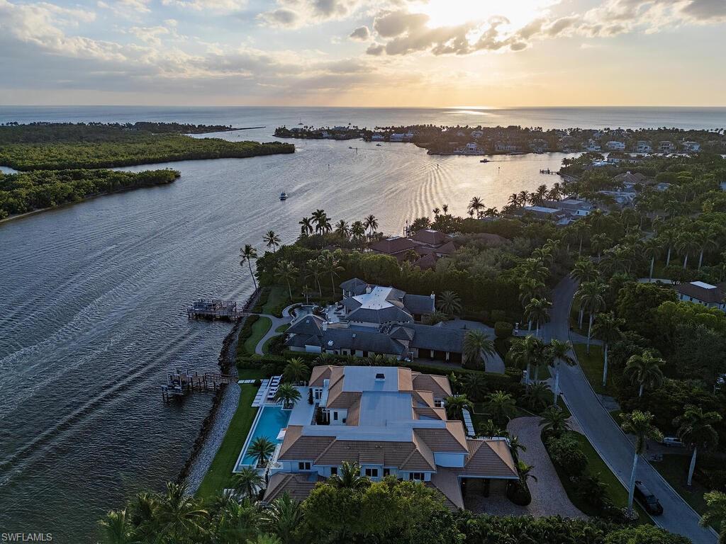 860 Admiralty Parade Naples, FL 34102 - Photo 44 of 45 an aerial view of a house with a lake view