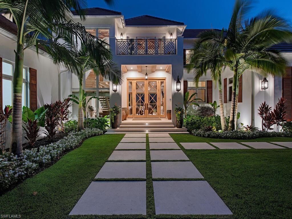 860 Admiralty Parade Naples, FL 34102 - Photo 8 of 45 a front view of a house