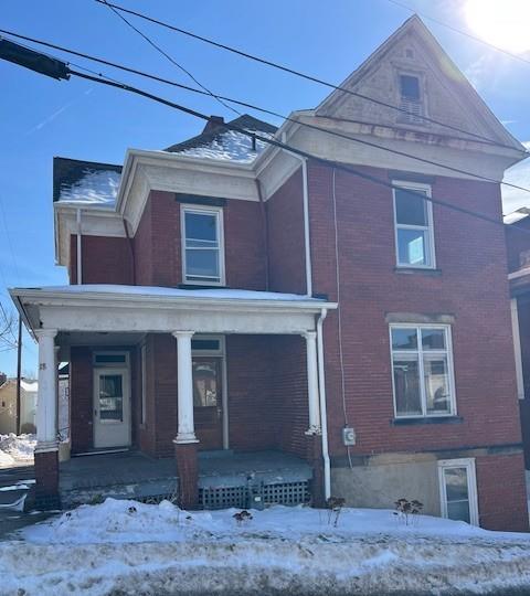 18 Observatory Street Manor, PA 15665 - Photo 1 of 14 BRICK TWO STORY WITH WRAP AROUND PORCH
