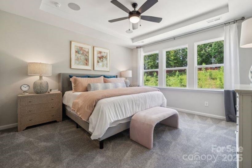 8664 Miles Gap Road Indian Land, SC 29707 - Photo 7 of 29 a bedroom with a bed and a large window