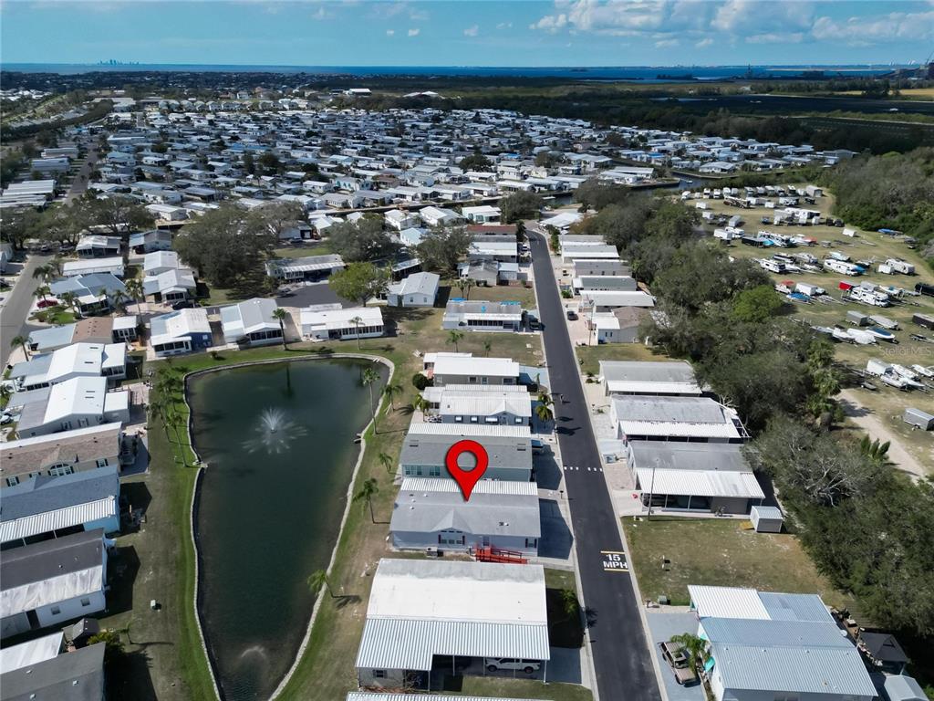 222 North St George Circle Apollo Beach, FL 33572 - Photo 1 of 33 an aerial view of residential houses with outdoor space