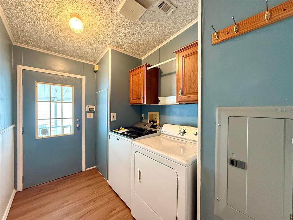 222 North St George Circle Apollo Beach, FL 33572 - Photo 20 of 33 a room with storage and utility
