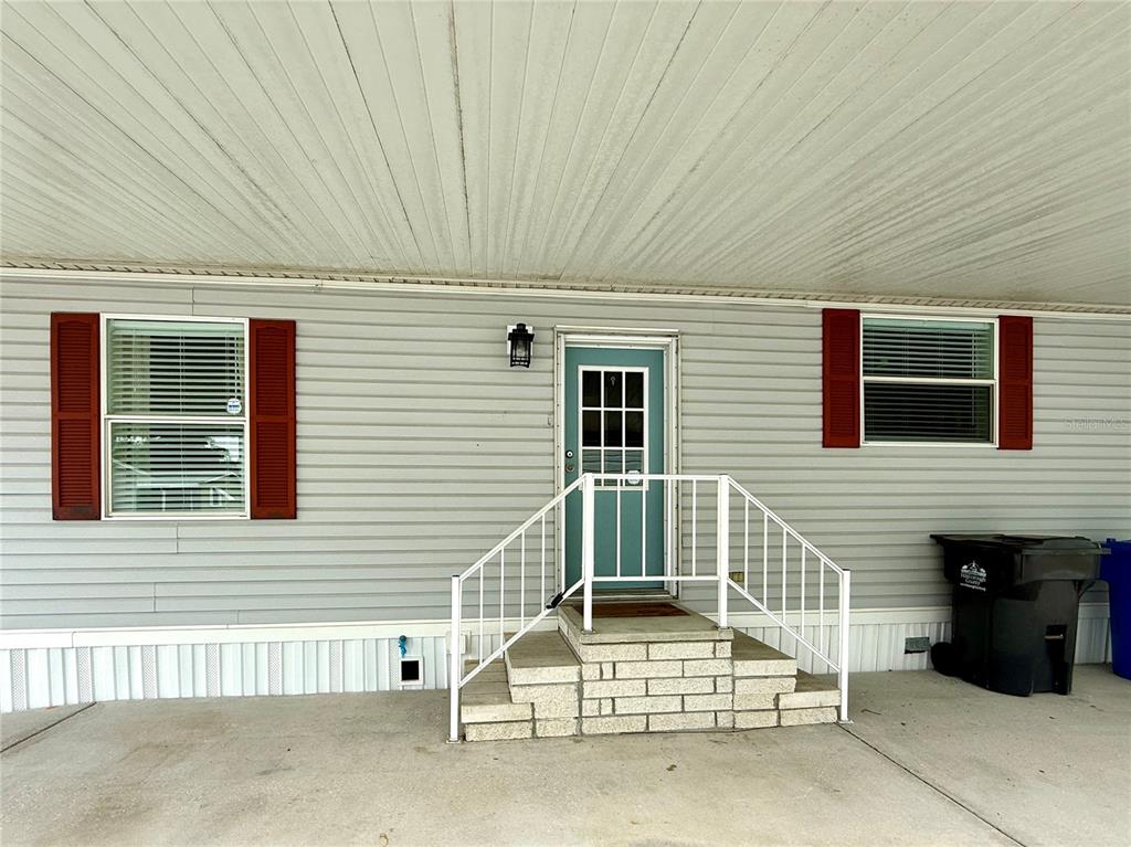 222 North St George Circle Apollo Beach, FL 33572 - Photo 21 of 33 a view of a house with a patio