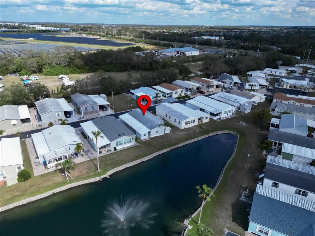 222 North St George Circle Apollo Beach, FL 33572 - Photo 23 of 33 an aerial view of residential houses with outdoor space