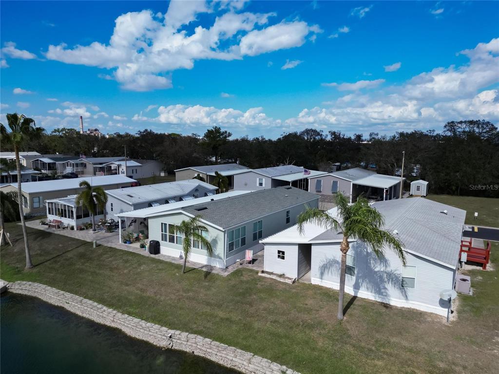 222 North St George Circle Apollo Beach, FL 33572 - Photo 24 of 33 a view of a big yard in front of the house