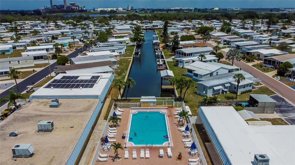 222 North St George Circle Apollo Beach, FL 33572 - Photo 28 of 33 an aerial view of a residential houses with outdoor space