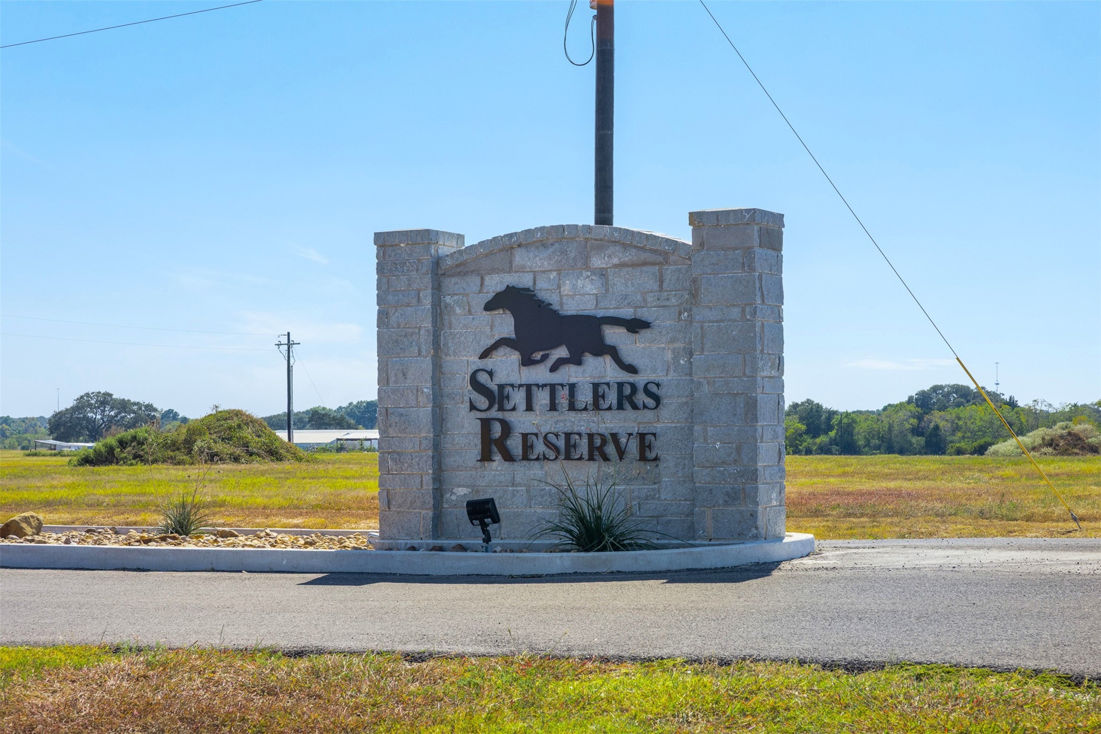 310 El Dorado Court Cat Spring, TX 78933 - Photo 29 of 29 a sign on the side of a road