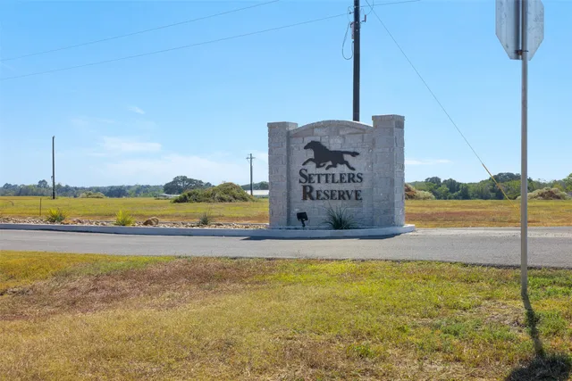 a view of a swimming pool and an outdoor space