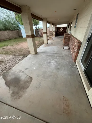 a view of a yard with large tree