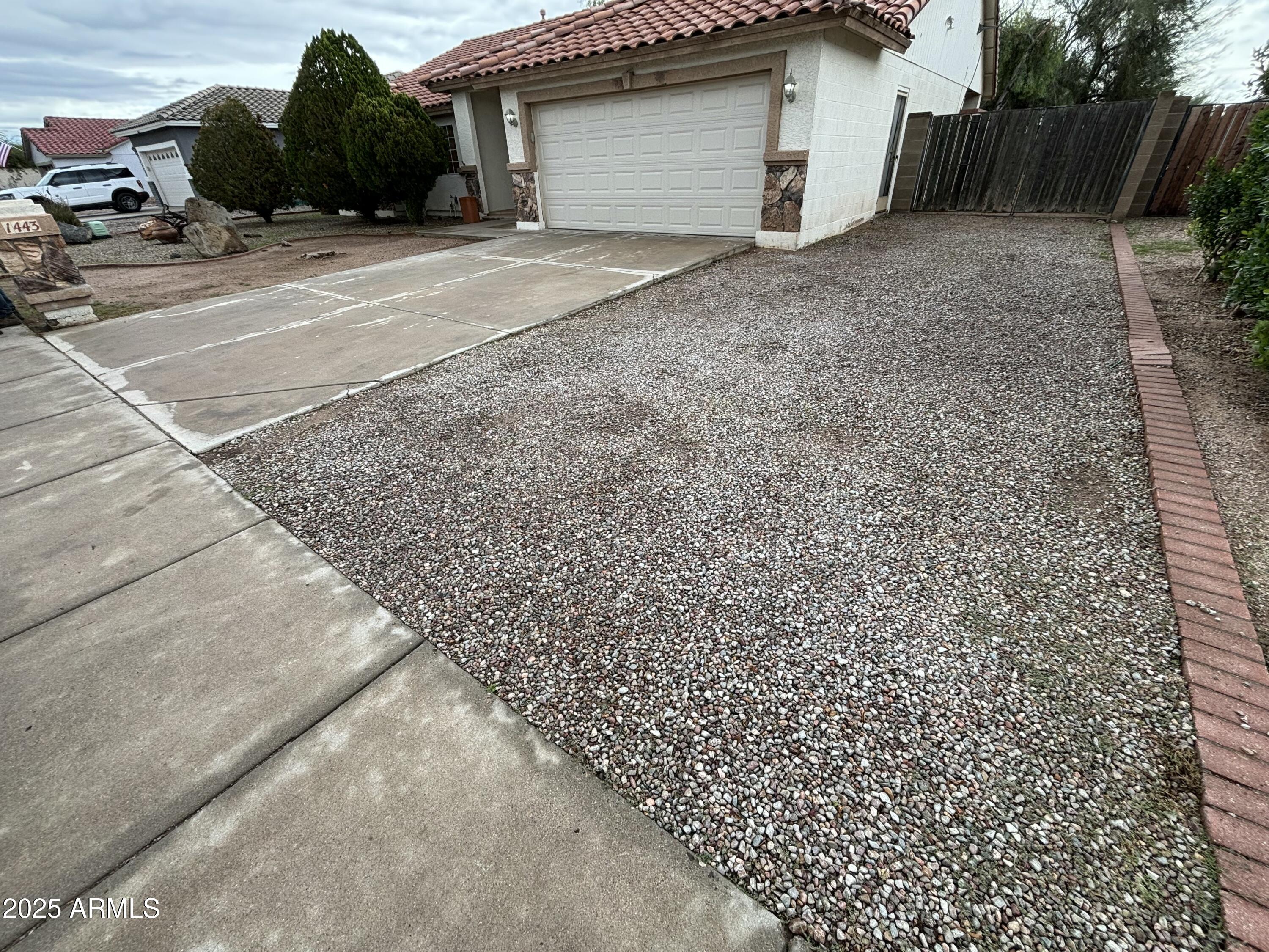 1443 West 14th Avenue Apache Junction, AZ 85120 - Photo 20 of 21 a view of a house with a yard