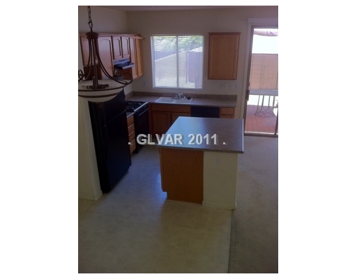 8212 Strawberry Spring Street Las Vegas, NV 89143 - Photo 2 of 2 Kitchen.