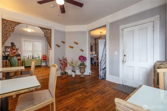 a living room with furniture and a table