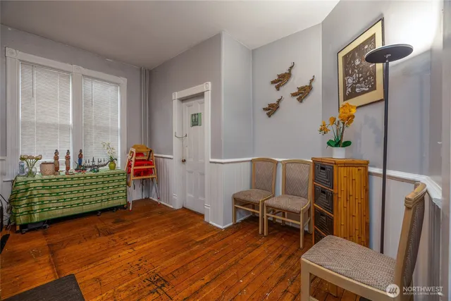 a bedroom with furniture and window