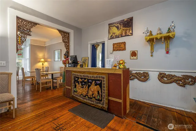 a view of a workspace with furniture and workspace