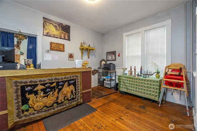 a view of a kitchen with lots of appliances