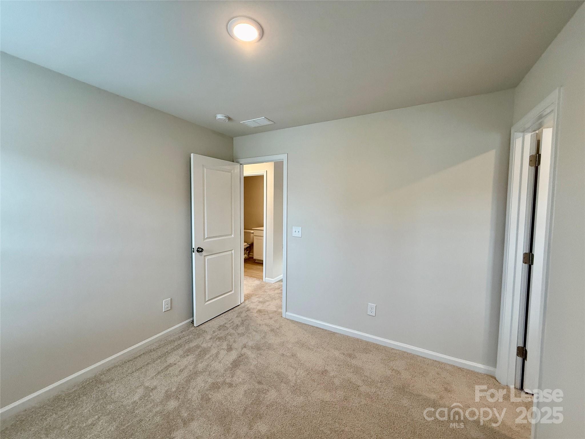 117 Dorian Place Troutman, NC 28166 - Photo 20 of 31 a view of an empty room and a window