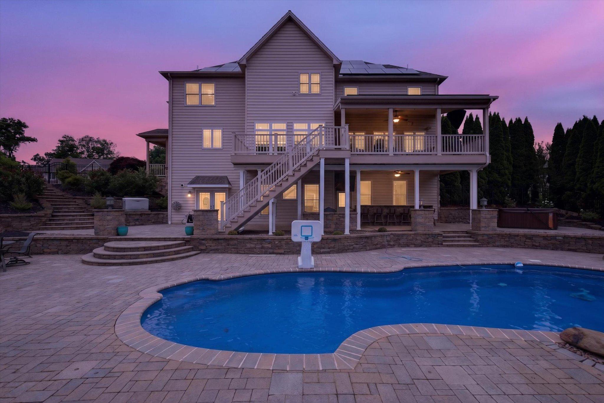 6505 Plowman Ridge Harrisburg, PA 17112 - Photo 56 of 83 Elegant home with serene poolside views.