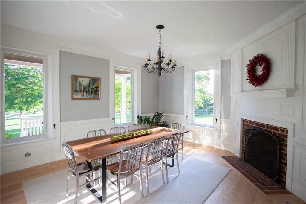 255 Camp Run Road Harmony, PA 16037 - Photo 13 of 49 a dining room with furniture window and wooden floor