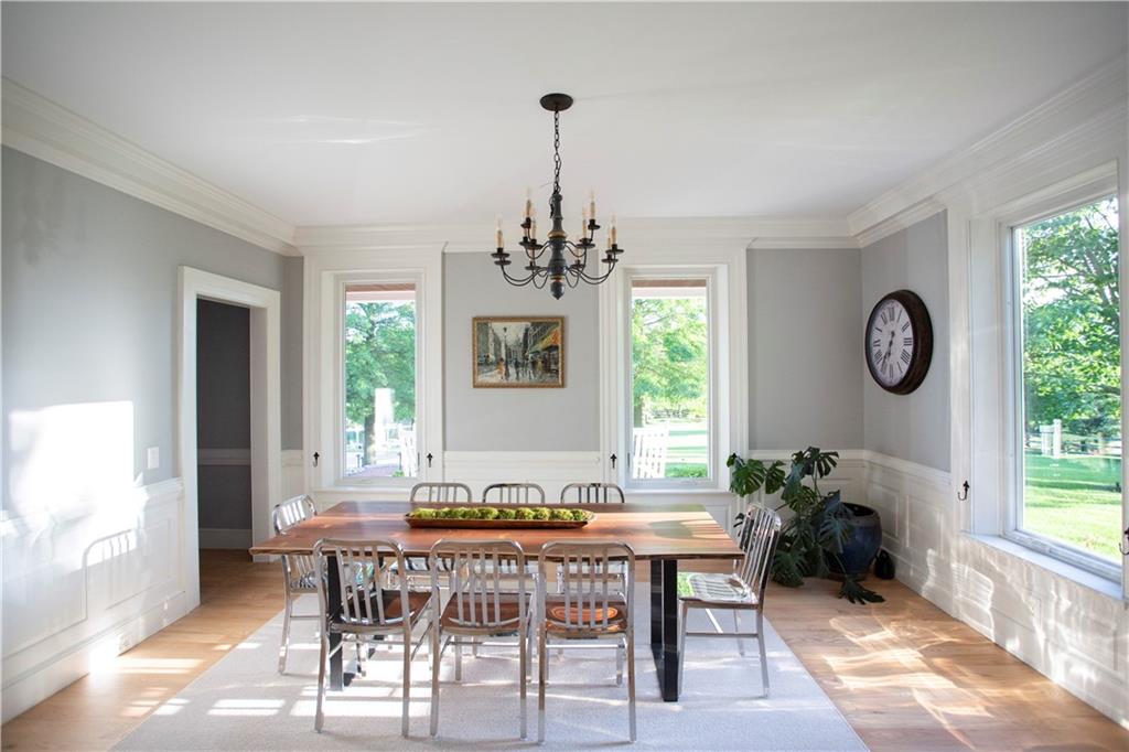 255 Camp Run Road Harmony, PA 16037 - Photo 14 of 49 a dining room with furniture a chandelier and a rug