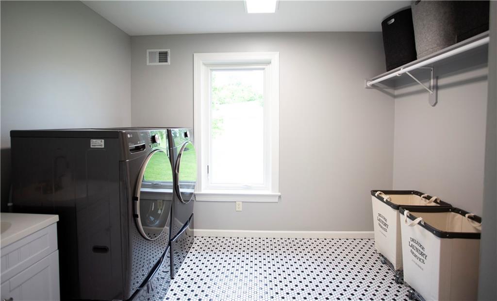 255 Camp Run Road Harmony, PA 16037 - Photo 17 of 49 a bathroom with a sink and a mirror