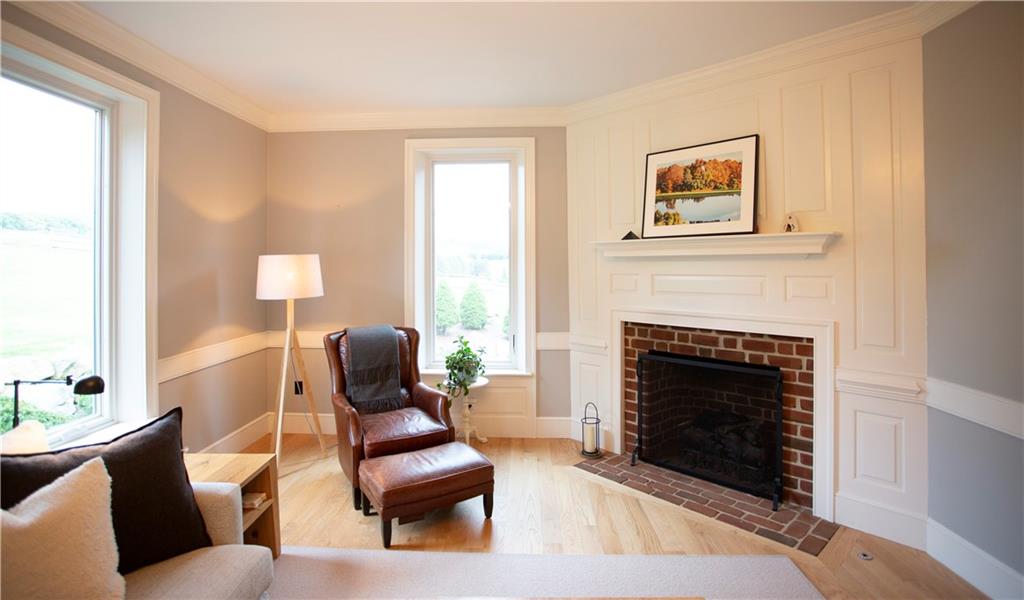 255 Camp Run Road Harmony, PA 16037 - Photo 19 of 49 a living room with furniture and a fireplace