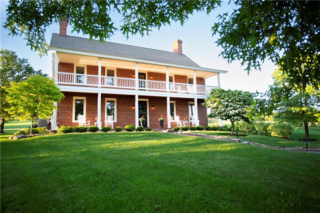 255 Camp Run Road Harmony, PA 16037 - Photo 2 of 49 a front view of a building with a garden