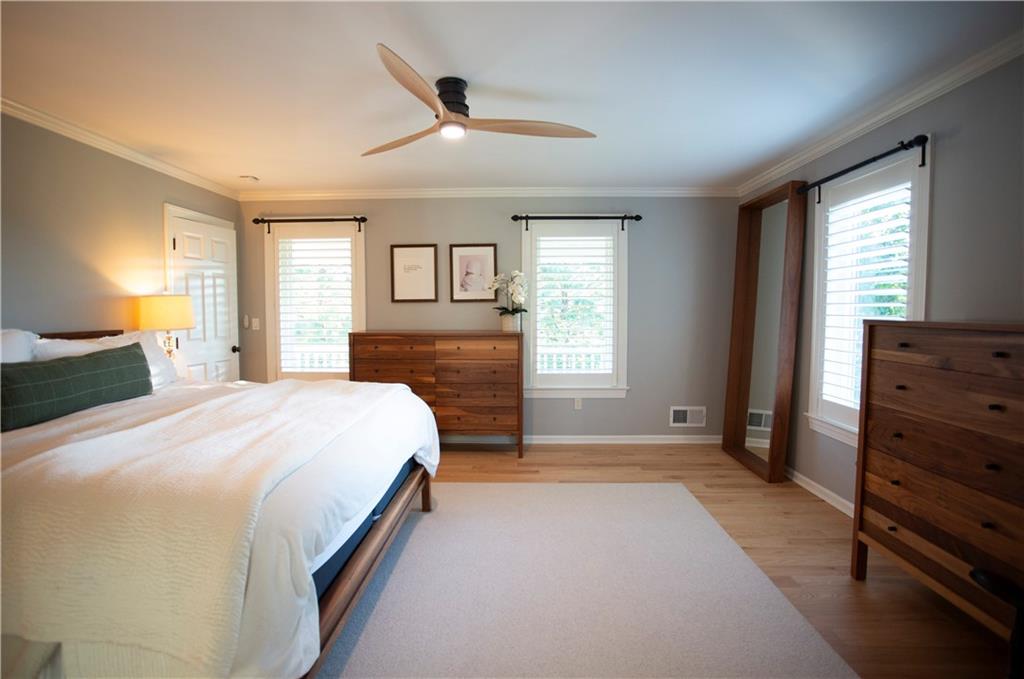 255 Camp Run Road Harmony, PA 16037 - Photo 23 of 49 a spacious bedroom with a bed and a dresser