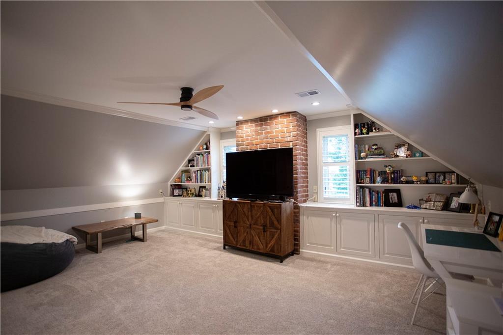 255 Camp Run Road Harmony, PA 16037 - Photo 32 of 49 a living room with furniture and a flat screen tv