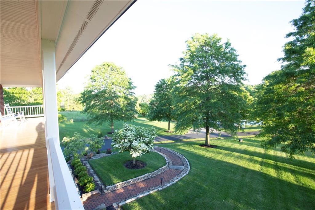 255 Camp Run Road Harmony, PA 16037 - Photo 45 of 49 a view of a yard with a large tree