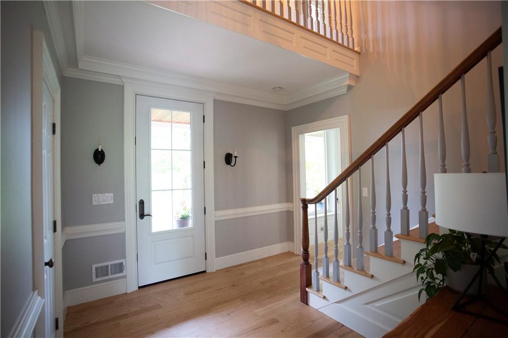 255 Camp Run Road Harmony, PA 16037 - Photo 8 of 49 a view of entryway with wooden floor and stairs