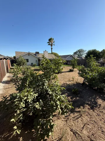 a view of a house with a street