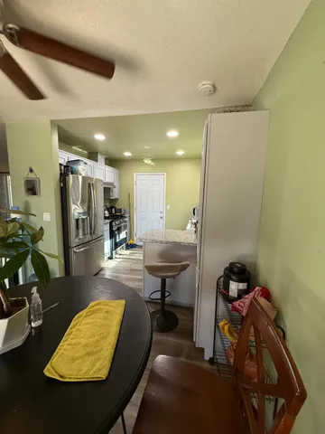 a view of a dining room with furniture