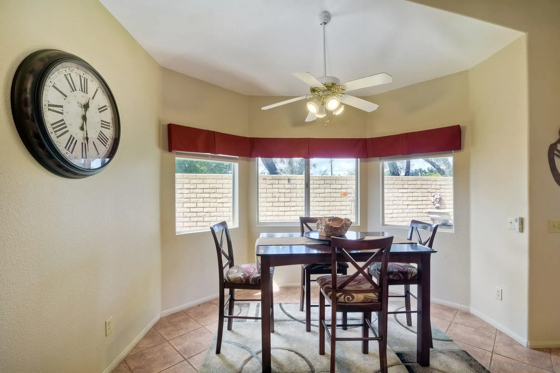 14430 Silver Heights Road Poway, CA 92064 - Photo 15 of 33 a view of a dining room with furniture window and outside view