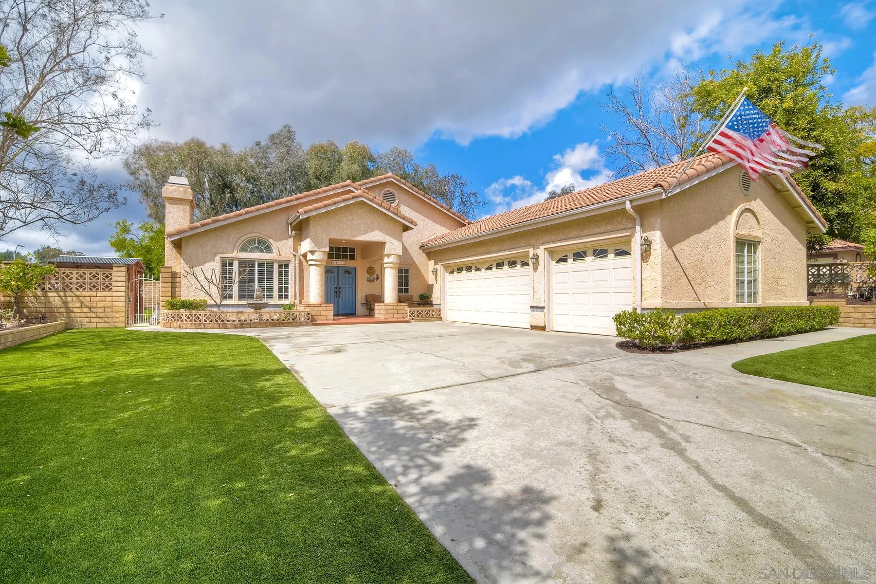 14430 Silver Heights Road Poway, CA 92064 - Photo 2 of 33 a front view of a house with a garden