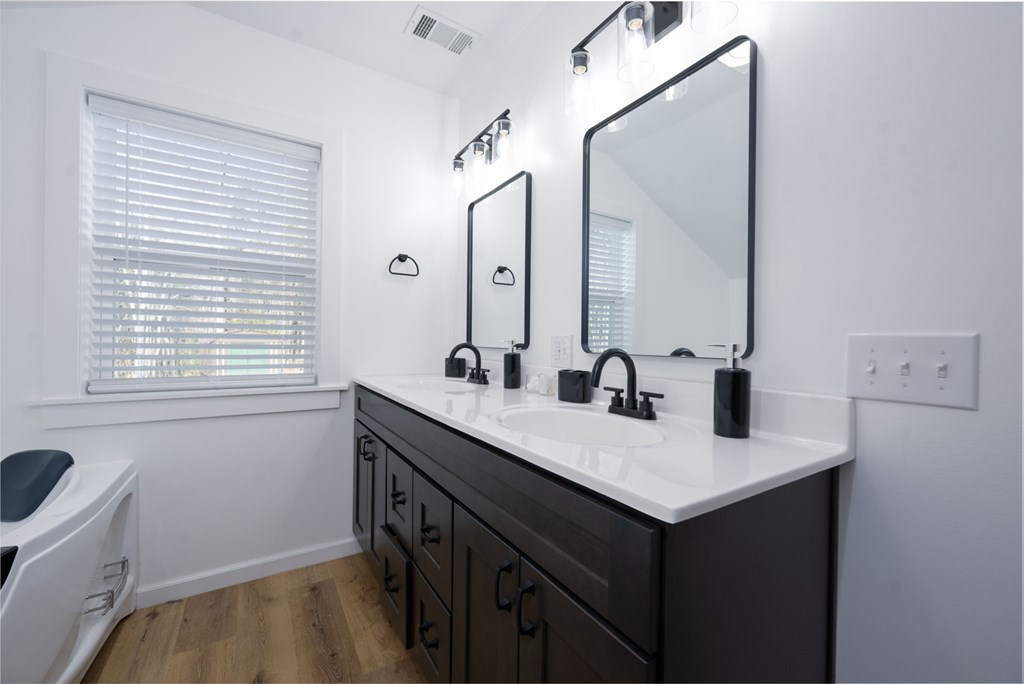 3160 Morrow Road Murphy, NC 28906 - Photo 11 of 44 a bathroom with a sink vanity and a mirror
