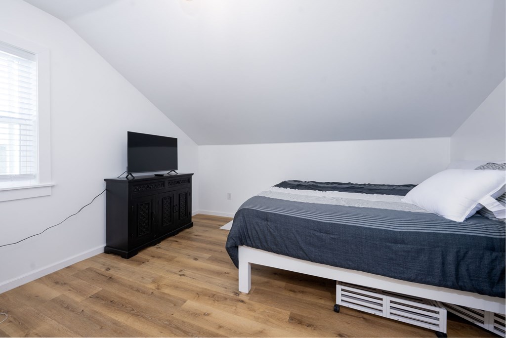 3160 Morrow Road Murphy, NC 28906 - Photo 15 of 44 a bedroom with a bed and a flat screen tv