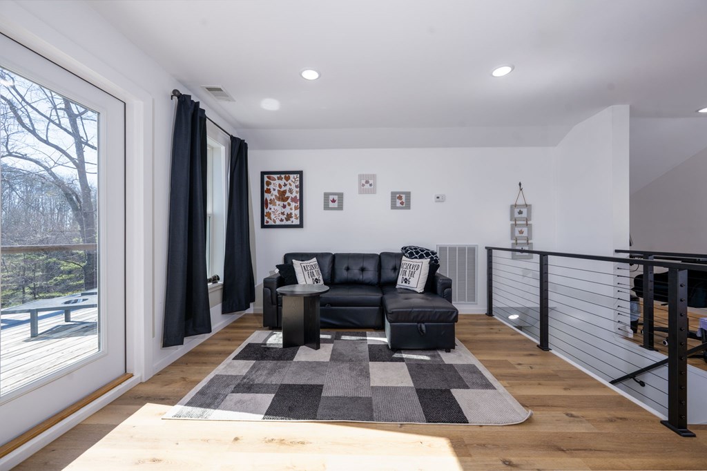 3160 Morrow Road Murphy, NC 28906 - Photo 18 of 44 a living room with furniture a rug and a table