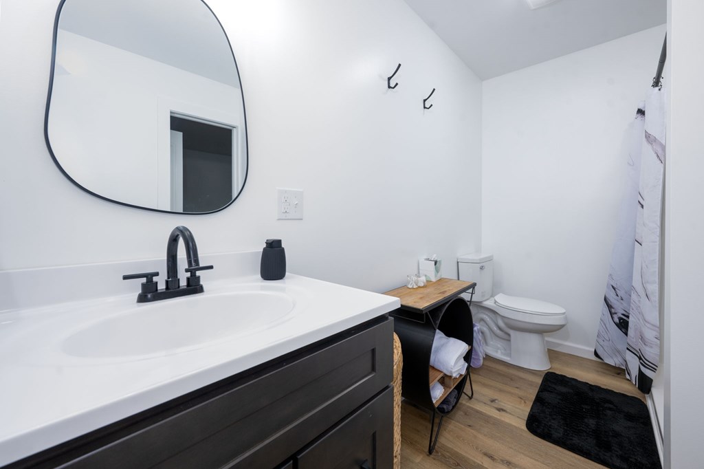 3160 Morrow Road Murphy, NC 28906 - Photo 27 of 44 a bathroom with a sink and a mirror