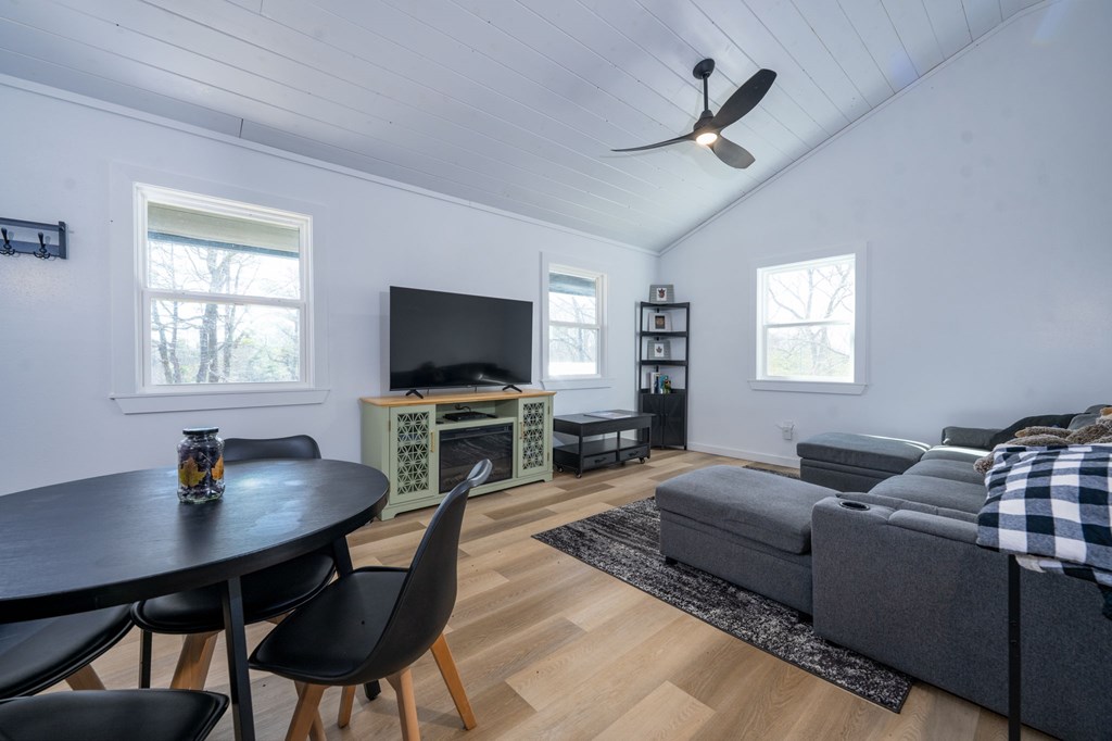 3160 Morrow Road Murphy, NC 28906 - Photo 34 of 44 a living room with furniture and a flat screen tv