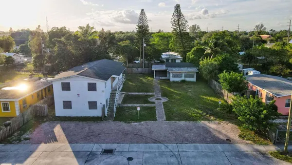 a view of a house with a garden