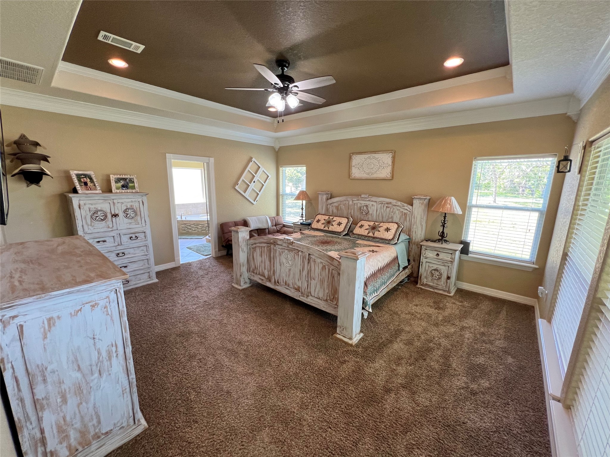 4916 County Road 819 Brazoria, TX 77422 - Photo 16 of 49 a spacious bedroom with a bed and window