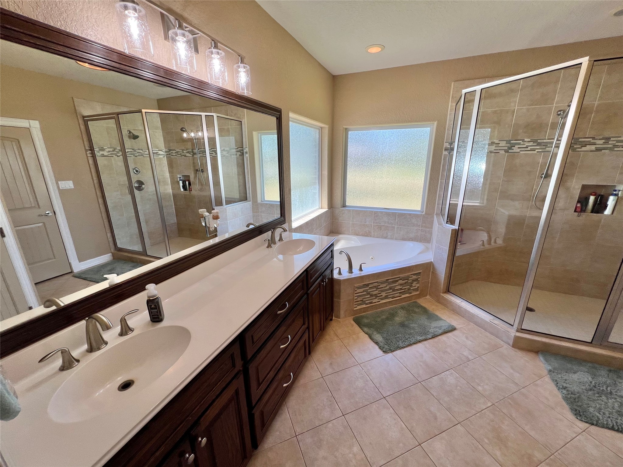 4916 County Road 819 Brazoria, TX 77422 - Photo 21 of 49 a bathroom with a mirror and a shower