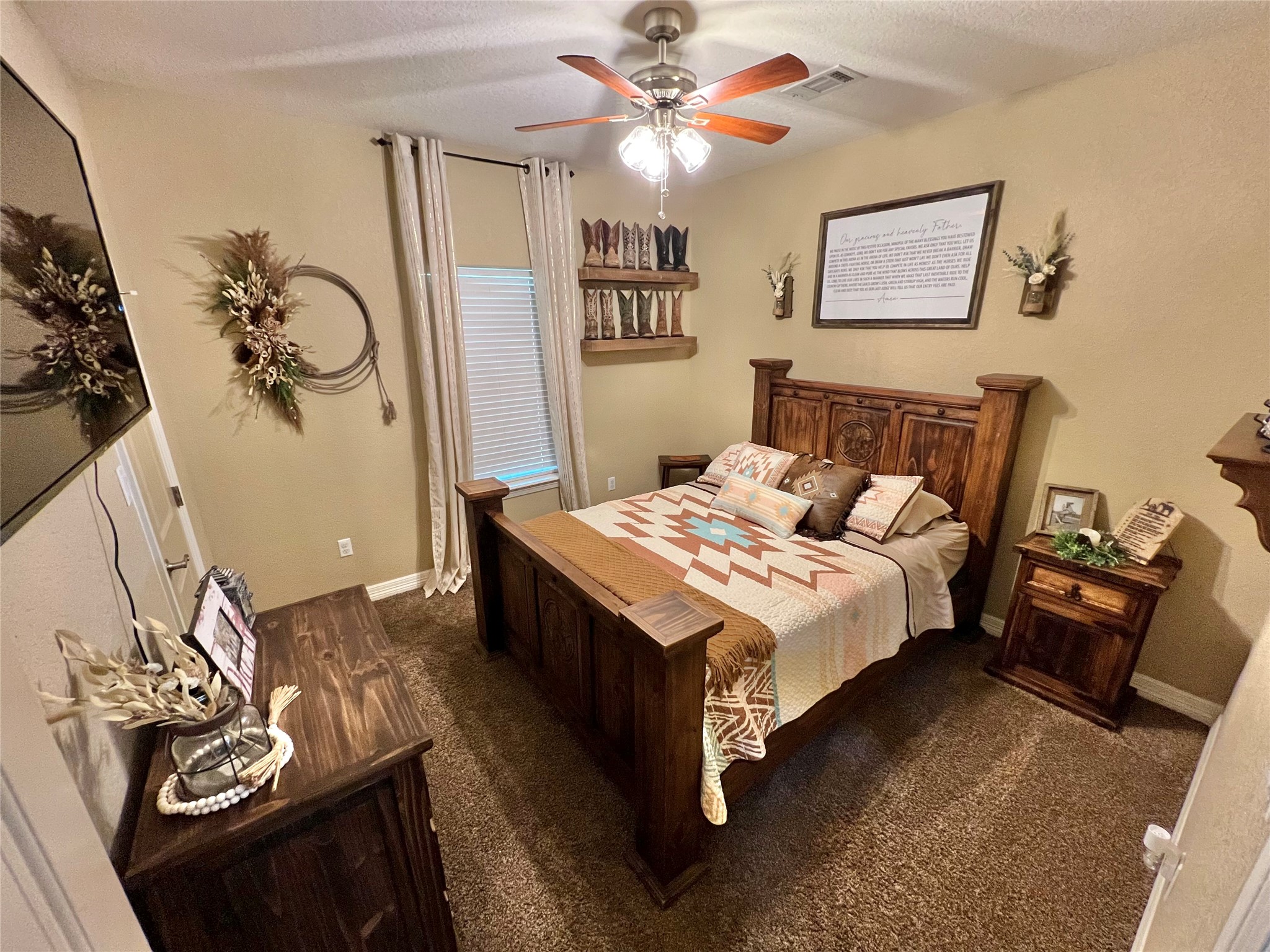 4916 County Road 819 Brazoria, TX 77422 - Photo 24 of 49 a bedroom with a bed and a chandelier