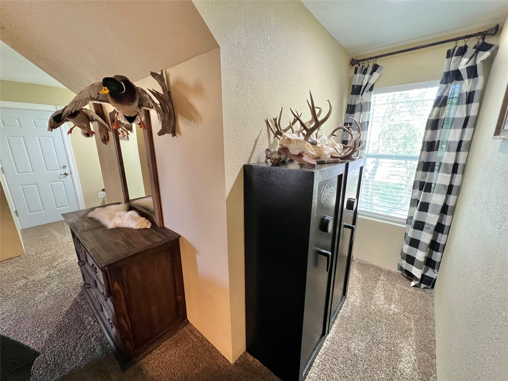 4916 County Road 819 Brazoria, TX 77422 - Photo 34 of 49 a view of walk in closet with clothes and shoes