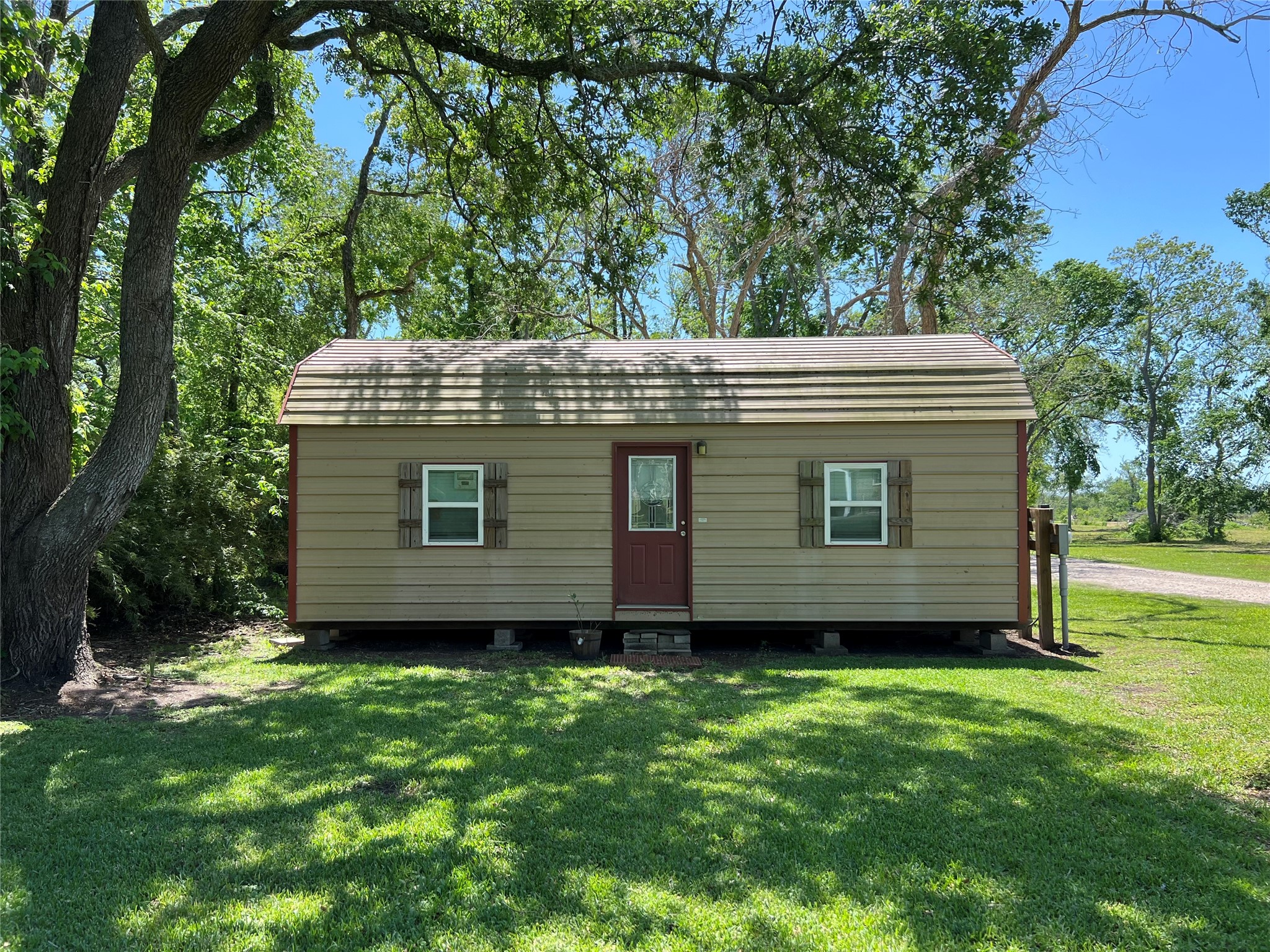 4916 County Road 819 Brazoria, TX 77422 - Photo 44 of 49 a view of a house with a yard