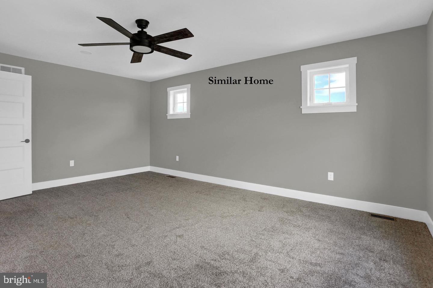 Hill Road, Unit CAMDEN New Freedom, PA 17349 - Photo 23 of 52 an empty room with a window and a fan