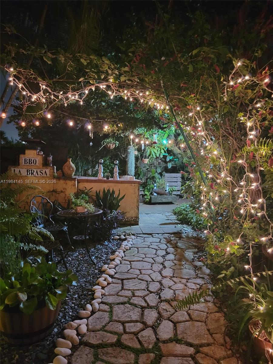 14365 Southwest 175th Terrace Miami, FL 33177 - Photo 3 of 31 a backyard of a house with lots of green space