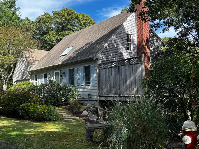 a backyard of a house with lots of green space