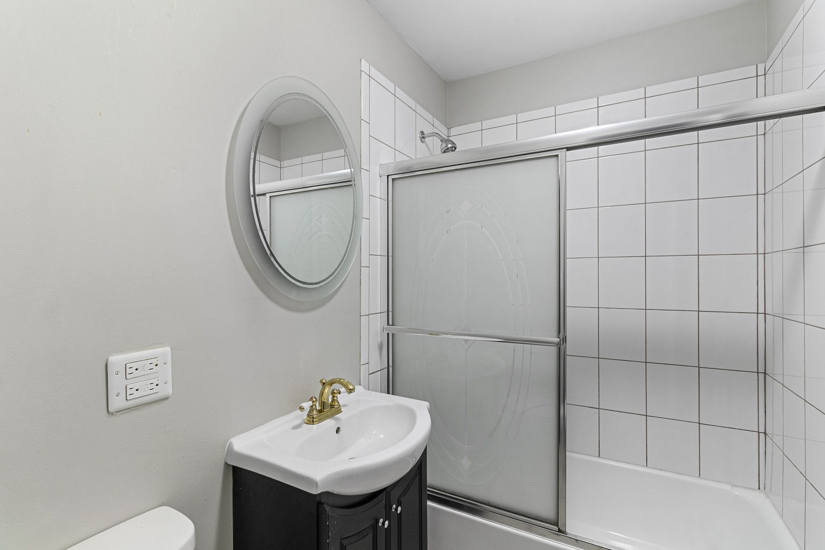 6837 Roberts Road Bridgeview, IL 60455 - Photo 11 of 22 a bathroom with a sink toilet and a shower