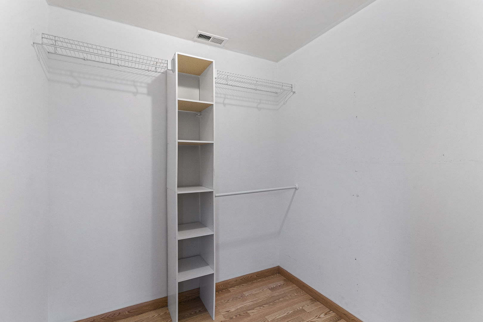 6837 Roberts Road Bridgeview, IL 60455 - Photo 15 of 22 a view of an empty walk in closet